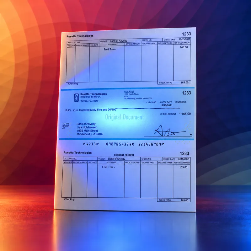 A printed voucher check under ultraviolet light, an invisible Original Document mark glowing across the check